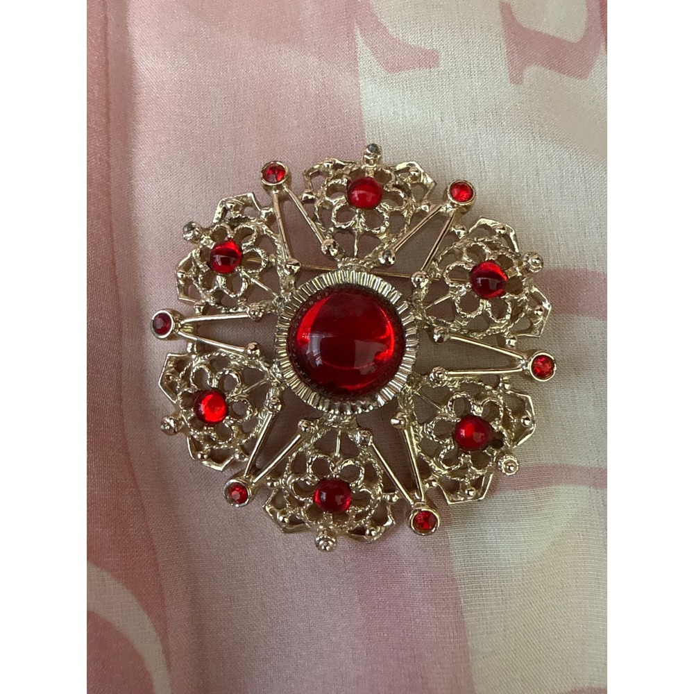 Sarah Coventry Vintage Gold Tone Red Rhinestone Filigree Starburst Brooch Pin
